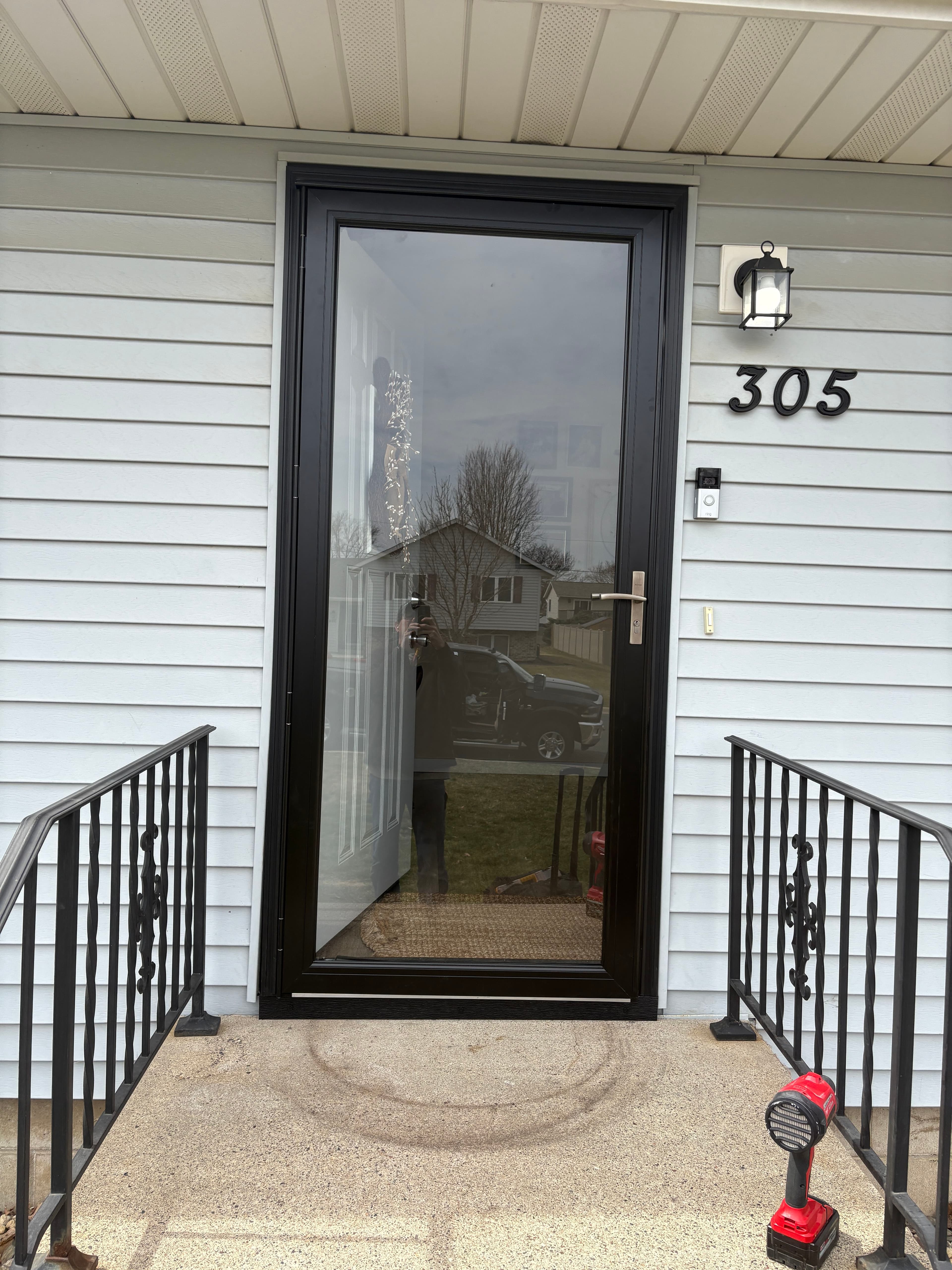Project Transforming Curb Appeal with New Storm Door Installation image
